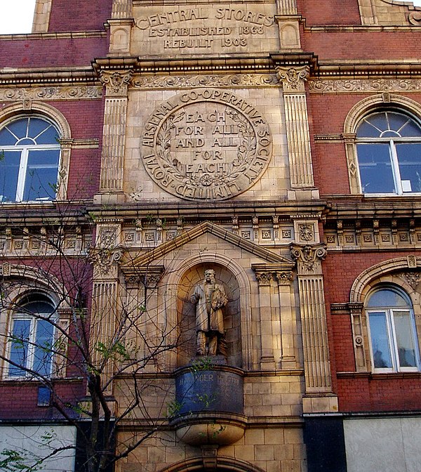 Detail of Central Stores in Powis Street, Woolwich, with the RACS motto and a statue of Alexander McLeod