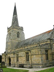 Part of a stone church seen from the southeast, with a protruding south aisle, and a tower surmounted by a spire