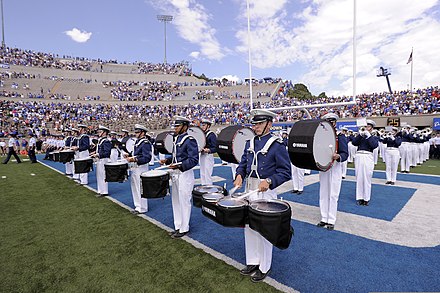 The United States Air Force Academy Drum and Bugle Corps performing prior to the start of a USAFA football game against Idaho State University at Falcon Stadium