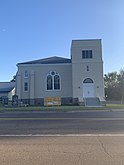 The outside of the United Methodist Church. The church continues to hold services every Sunday.