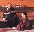 The sixteenth Karmapa Lama (Rangjung Rigpe Dorje), with monk, at Rumtek Monastery, Sikkim (cropped).jpg