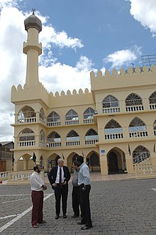 A mosque in Antananarivo. US Navy 070320-F-0524H-078 Chaplain (Cmdr.) W.M. Sonny Dinkins talks with leaders of the Islamic Grand Mosque in Antananarivo during a trip to meet area religious leaders.jpg