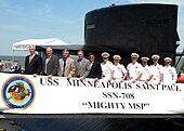 US Navy 070622-N-8655E-004 Eleven of 12 former commanding officers of the Los Angeles-class fast-attack submarine USS Minneapolis-St. Paul (SSN 708) pose with the submarine^rsquo,s current Commanding Officer Cmdr. Woods R. Brow