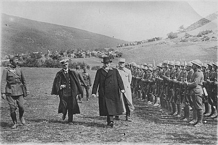 Venizelos reviews a section of the Greek army on the Macedonian front during the First World War, 1918. He is accompanied by Admiral Pavlos Koundouriotis (left) and General Maurice Sarrail (right).