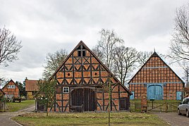 Hall houses from 1716 and 1841 in the southern Rundling part of the village (and a granary on the left)