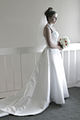 2003 bride in white wedding dress.