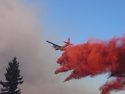 Neptune Aviation Services' P-2V Neptune drops Phos-Chek on the 2007 WSA Complex fire in Oregon.