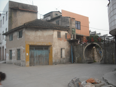 Zhicheng Vice-East Gate And Qianjin Fabric Store.png