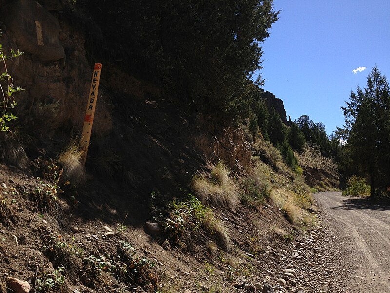 File:2014-09-25 13 02 43 View south at the sign marking the Idaho-Nevada border at the north end of Jarbidge-Charleston Road (Elko County Route 748) in Elko County, Nevada.jpg