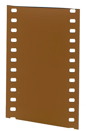 A strip of undeveloped 35 mm color negative film from a roll; B&W negative film is similar; "Negative" may be inferred from the BH style perforations. 35mm-undevel.jpg