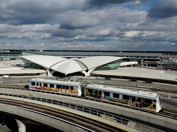 An AirTrain in front of the TWA Flight Center