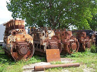 Several Alco 539T engines in various states of completion rest at an aggregate facility in Orlando, Florida. Alco 539T Locomotive Prime Movers.jpg