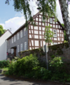 English: Half-timbered building (former school) in Alsfeld Berfa Schulstrasse 12, Hesse, Germany