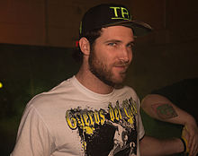 South African wrestler Angelico, the third man to escape the cage. Angelico at Smash Nov 2015.jpg