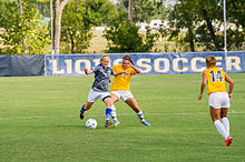 The Rattlers women's soccer team in action against the Texas A&M-Commerce Lions in 2014 Athletics-Soccer vs StMU-9142 (15006638050).jpg