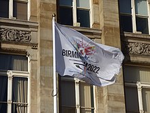 Birmingham 2022 flag (with bidding logo) in Victoria Square, Birmingham, in January 2018 Birmingham 2022 Flag.jpeg