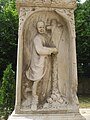 Basorelief cu chipul negustorului Ioan Christe Popovici, sculptat pe monumentul său funerar