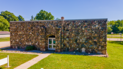 CWA Leonidas Stone School Front of building from Drone.png