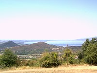 The lake seen by southern mountains, Cortona on the right