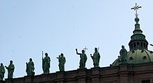 Statues of the patron saints of the parishes of Montreal atop the cathedral's main entrance Cathedral-Basilica of Mary, Queen of the World, ArmAg (1).jpg