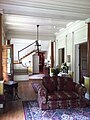 Foyer. The pine flooring of the house is of high tar content and thought to be termite resistant.