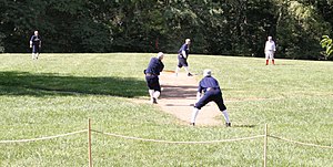 A 2005 vintage base ball game, played by 1886 rules. Vintage games are live contests that seek to portray the authenticity of the early game. (The term "reenactment" is a common misnomer; games are contested and not meant to recreate a specific historical event.) Conner-prairie-baseball.jpg