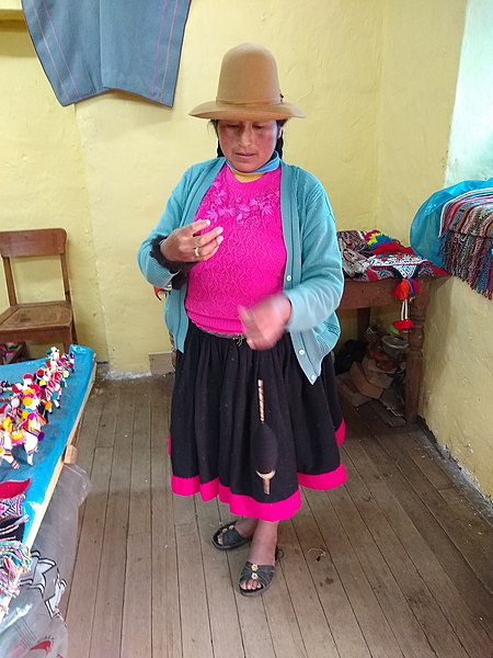 File:Cusco Peru- Spinning raw wool into thread III.jpg