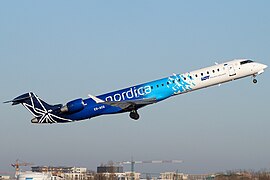 Nordica-maskin tar av fra Frédéric Chopin lufthavn Warszawa-Okęcie ved Warszawa i Polen.