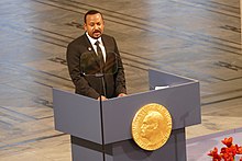 Prime Minister Abiy Ahmed receiving the Nobel Peace Prize in Oslo in 2019 Ethiopian Prime Minister Abiy Ahmed receiving the Nobel Peace Prize in Oslo 2019.jpg