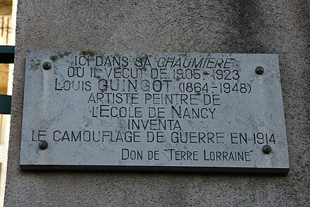 A plaque in France commemorating Louis Guingot for inventing modern military camouflage.