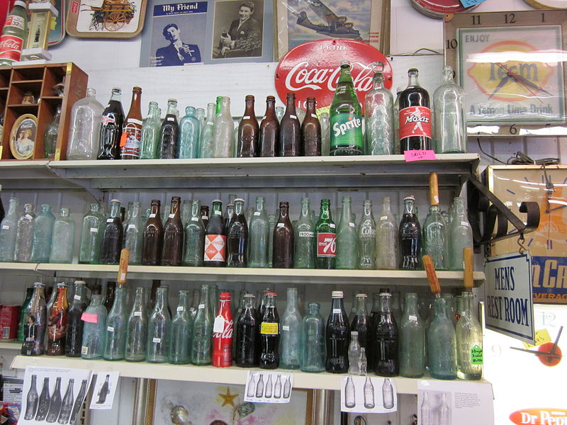 File:Ft Walton Shop bottle shelves.JPG