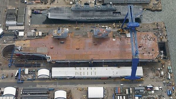 Queen Elizabeth alongside Illustrious on the day of her naming ceremony