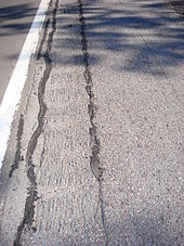 An example of extensive cracking in rumble strips due to frost jacking on Interstate Highway 81 north of Syracuse. These parallel cracks were sealed. There were other sections with grass and weeds growing up through the rumble strip cracks I-81 northern New York Rumble Strip With Cracks 2010.JPG