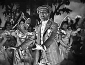 Cagney as George M. Cohan, performing "The Yankee Doodle Boy" from Yankee Doodle Dandy (1942) James Cagney in Yankee Doodle Dandy trailer.jpg