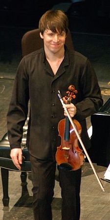 American violinist Joshua Bell wears black on stage.