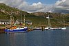 Fishing vessels offload at the harbour