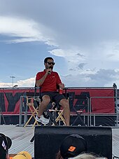 Larson during the Fanzone at Daytona International Speedway on July 5, 2019 Kylelarsondaytonajuly2019.jpg