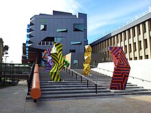 LIMS1 building featuring 'Murri Totems' by Reko Rennie LIMS building 4.jpg