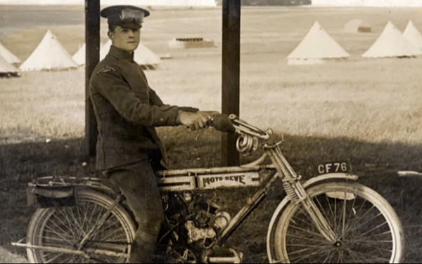 McCudden indulging in his other engineering interest: motorcycles. Pictured here on a Moto Reve model, 1913 at the RFC manoeuvres.