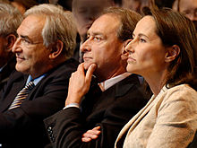 From left to right: Dominique Strauss-Kahn, Bertrand Delanoe and Segolene Royal sitting in the front row at a meeting held on 6 February 2007 by the PS at the Carpentier Hall in Paris Meeting Royal 2007 02 06 n1.jpg