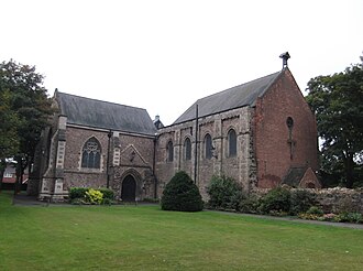 The restored Parish Church of St Mary The Virgin, incorporating a medieval wall and windows Nuneaton Priory.JPG