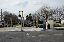 A crossing without road markings can have pedestrian signals.