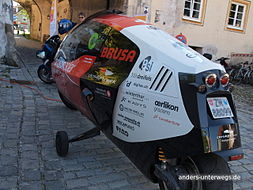 Rear view (from the left) of the fully streamlined motorbike