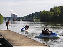Summer fun at Point Marion Community Park's dock, with Fort Martin Power Plant in the background Point Marion PA 2019 06-23.jpg