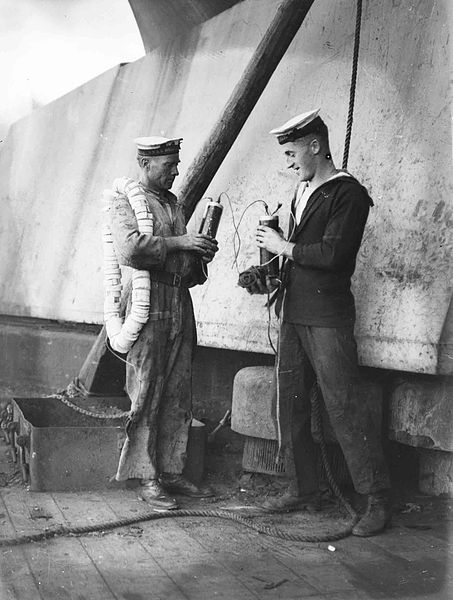 File:Sailors holding demolition charges on HMAS Australia.jpg