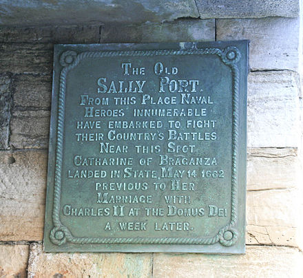 A plaque at Sally Port in the Garrison walls at Portsmouth commemorates Catherine's first setting foot on English soil.