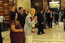 U.S. Secretary of State Hillary Rodham Clinton is greeted by employees at the Taj Coromandel with a traditional greeting in Chennai, on in 2011 Secretary Clinton Is Greeted By Taj Coromandel Employees.jpg