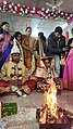 File:Sindur daan Hindu ritual as the groom is full blind ladies assisting her to complete rituals at Voice Of World Kolkata 01.jpg