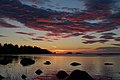 Päikeseloojang Põhjalahe rannikul Soomes