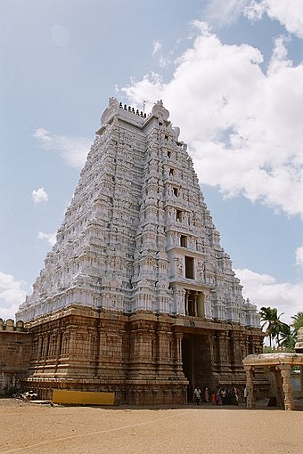 The "Vellai Gopuram" (white tower) on the eastern entrance of the Srirangam temple named after a Devadasi[258]
